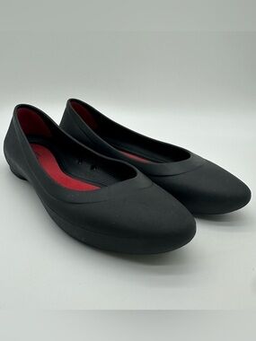 CROCS Black Ballet-Style Slip-On Flats with Red Insole